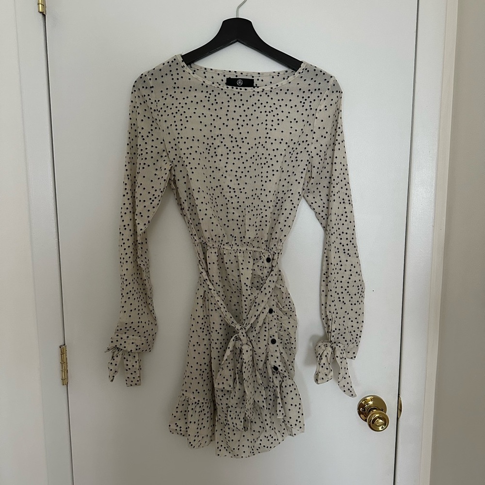 Cream and black polka dot dress with ruched detailing